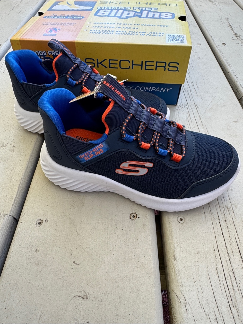 Skechers Kids Navy Slip-On Sneakers with Orange and Blue Accents - Picture 4 of 6